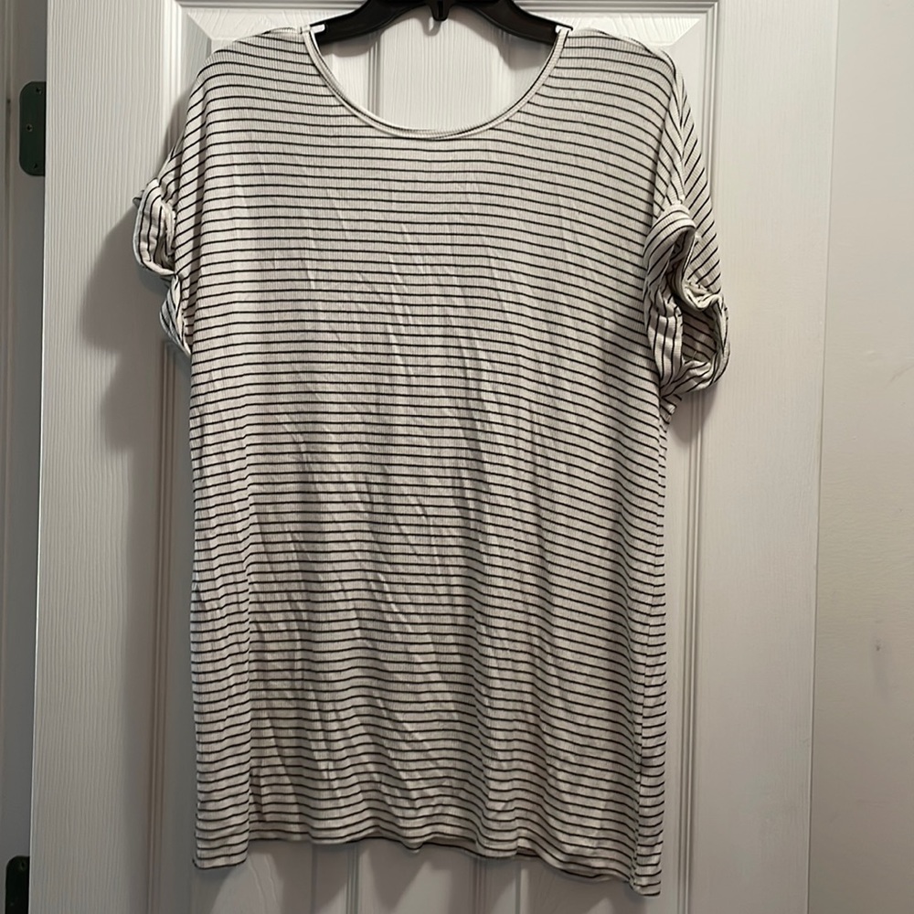 Black and white striped top. Lightly worn, great condition. Smoke free home.